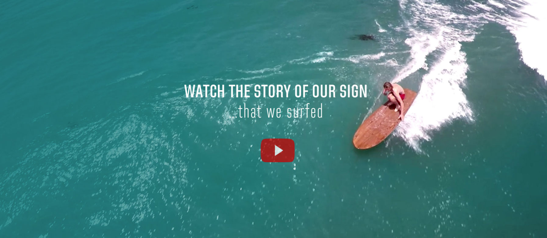 Watch the story of our sign that we surfed with youtube play button