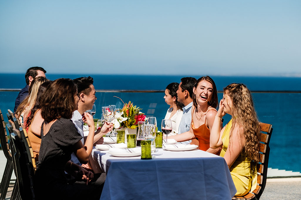 People sitting around a table at Dukes La Jolla